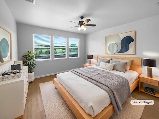 312 La Escalera Dr, Leander, TX 78641 - bedroom with light wood-type flooring and a ceiling fan