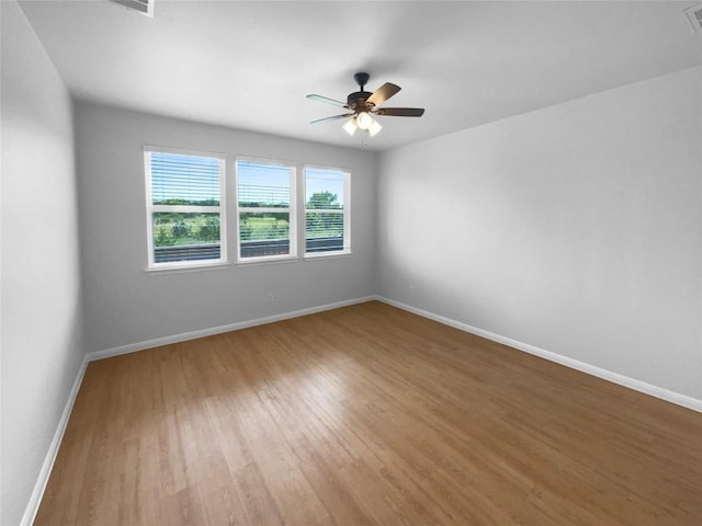 312 La Escalera Dr, Leander, TX 78641 - spare room with light wood finished floors and ceiling fan
