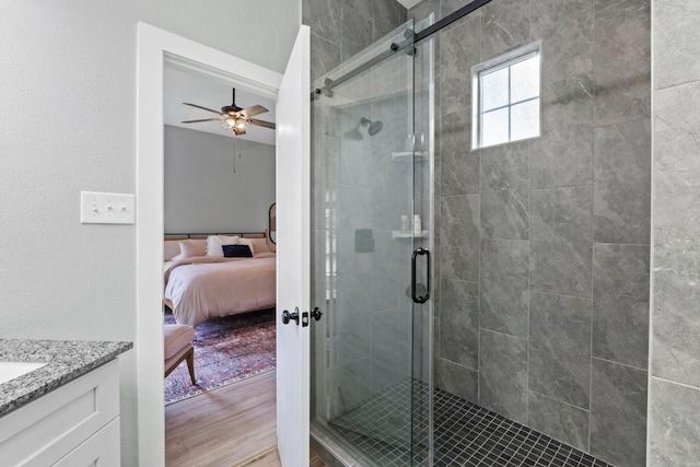 2134 Cervin Blvd, Austin, TX 78728 - ensuite bathroom with vanity, a stall shower, and ceiling fan
