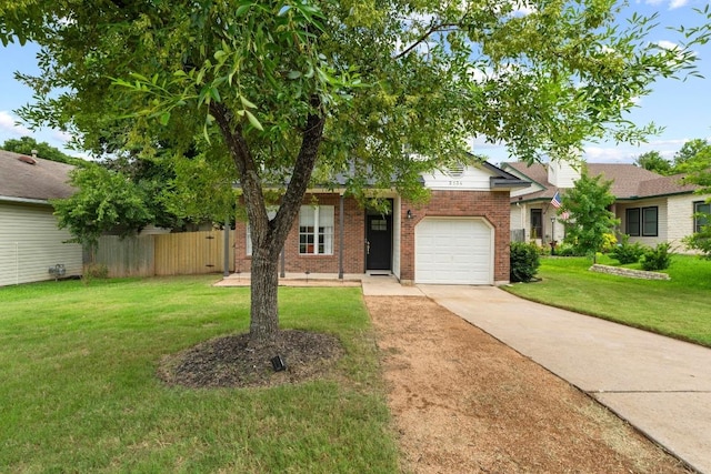 2134 Cervin Blvd, Austin, TX 78728 - view of front of property featuring brick siding, driveway, and a garage