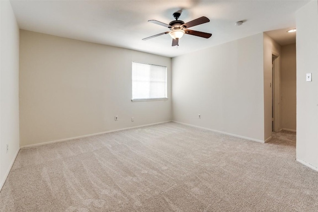 6910 Hart Ln Unit 807, Austin, TX 78731 - spare room with light carpet, a ceiling fan, and a smoke detector