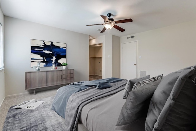 6910 Hart Ln Unit 807, Austin, TX 78731 - bedroom featuring light colored carpet and a ceiling fan