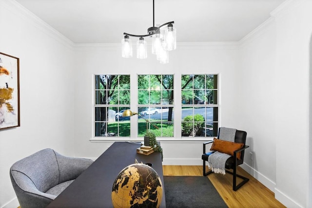 13305 Teton Ridge Cv, Austin, TX 78727 - living area with ornamental molding, wood finished floors, and a chandelier