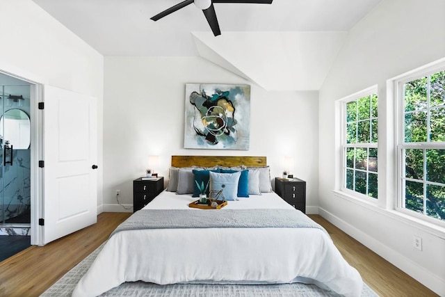 13305 Teton Ridge Cv, Austin, TX 78727 - bedroom with wood finished floors and a ceiling fan