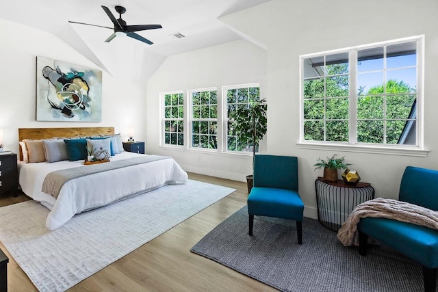 13305 Teton Ridge Cv, Austin, TX 78727 - bedroom with wood finished floors, ceiling fan, and lofted ceiling