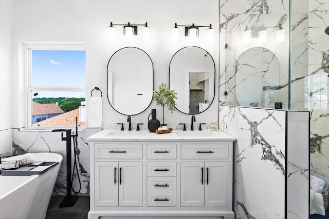 13305 Teton Ridge Cv, Austin, TX 78727 - full bath with a freestanding tub, double vanity, a marble finish shower, and a water view