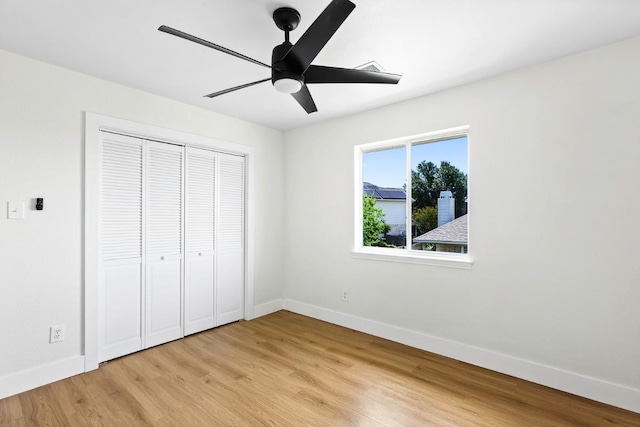 13305 Teton Ridge Cv, Austin, TX 78727 - unfurnished bedroom featuring light wood-type flooring, a closet, and a ceiling fan