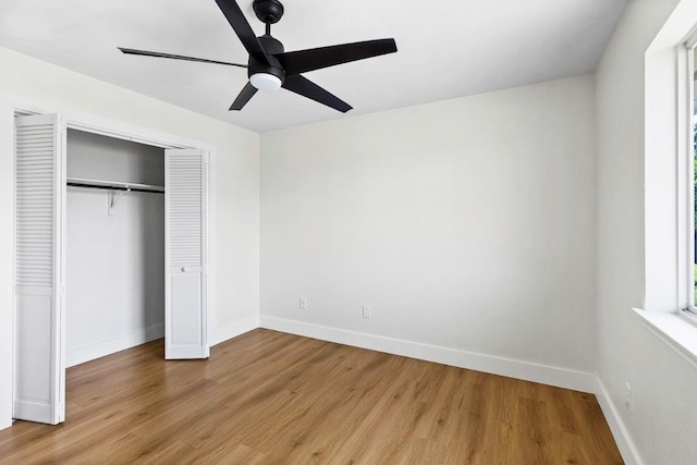 13305 Teton Ridge Cv, Austin, TX 78727 - unfurnished bedroom with light wood-style floors, a closet, and a ceiling fan
