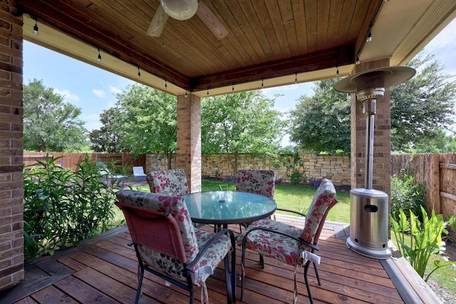 104 Atlanta Park Dr, Georgetown, TX 78628 - wooden deck with a fenced backyard, a ceiling fan, and outdoor dining space