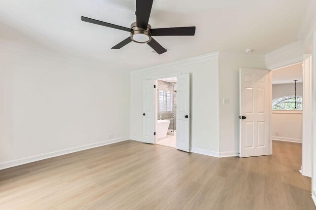 11108 Brista Way, Austin, TX 78726 - unfurnished bedroom with ornamental molding, light wood-type flooring, ensuite bath, and ceiling fan