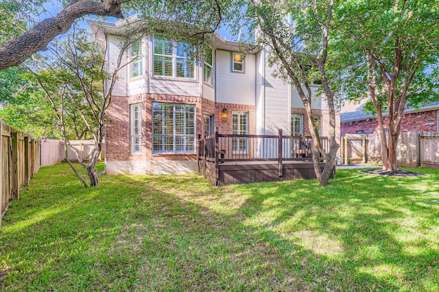 11108 Brista Way, Austin, TX 78726 - rear view of house with a wooden deck, a fenced backyard, and brick siding