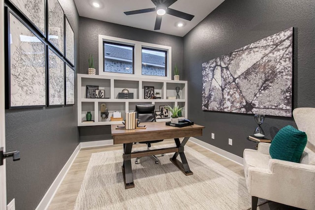 19125 Hopper Ln, Austin, TX 78738 - office space with a textured wall, wood finished floors, and a ceiling fan