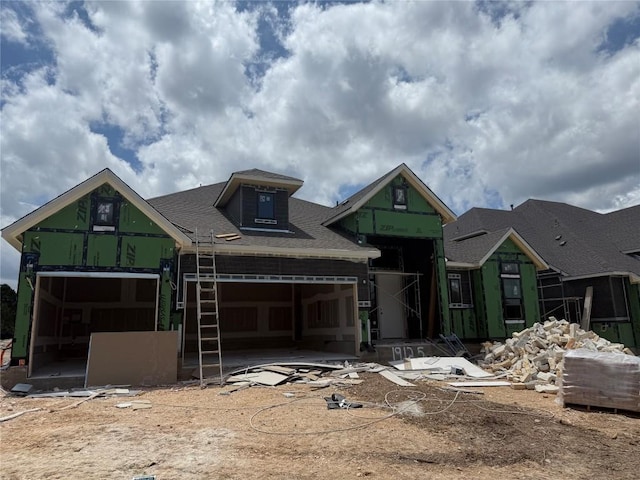 19125 Hopper Ln, Austin, TX 78738 - unfinished property with a garage and roof with shingles