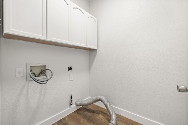 2208 Drue Ln, Cedar Park, TX 78613 - laundry room with hookup for an electric dryer, cabinet space, wood finished floors, hookup for a gas dryer, and washer hookup