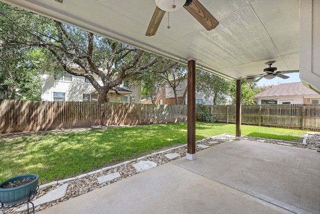 2208 Drue Ln, Cedar Park, TX 78613 - fenced backyard with a ceiling fan and a patio area