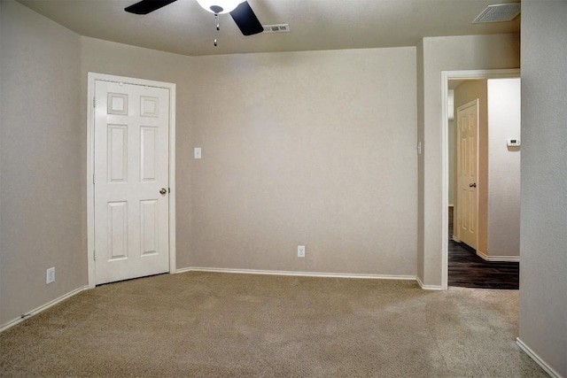 306 Grutsch Dr, Bastrop, TX 78602 - empty room with carpet flooring and a ceiling fan