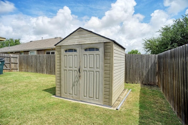 306 Grutsch Dr, Bastrop, TX 78602 - view of shed featuring a fenced backyard