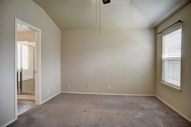 306 Grutsch Dr, Bastrop, TX 78602 - unfurnished room featuring vaulted ceiling, carpet flooring, healthy amount of natural light, and a ceiling fan