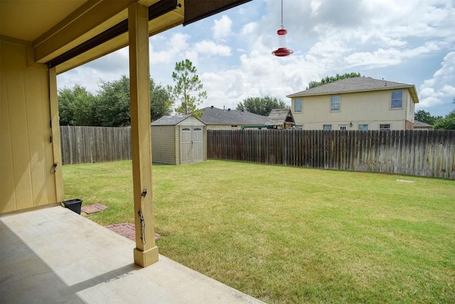 306 Grutsch Dr, Bastrop, TX 78602 - fenced backyard with a patio area and a shed