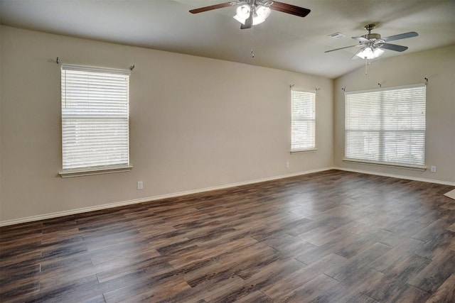 306 Grutsch Dr, Bastrop, TX 78602 - unfurnished room featuring ceiling fan, dark wood-style flooring, and vaulted ceiling