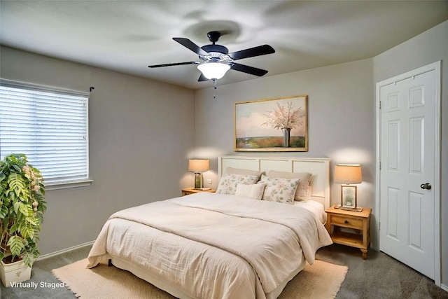306 Grutsch Dr, Bastrop, TX 78602 - carpeted bedroom with baseboards and ceiling fan