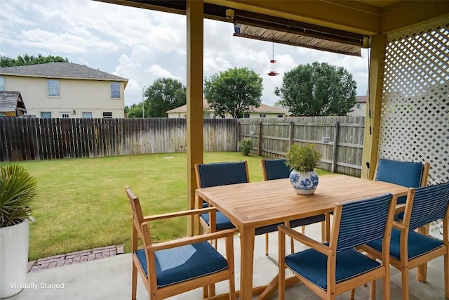 306 Grutsch Dr, Bastrop, TX 78602 - fenced backyard featuring a patio and outdoor dining area