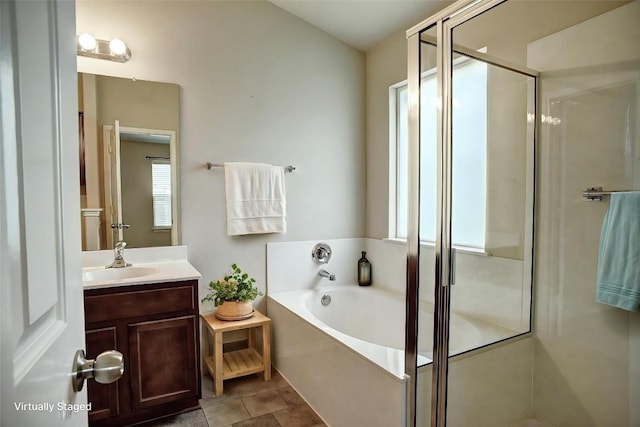 306 Grutsch Dr, Bastrop, TX 78602 - full bath with a shower stall, a bath, and vanity