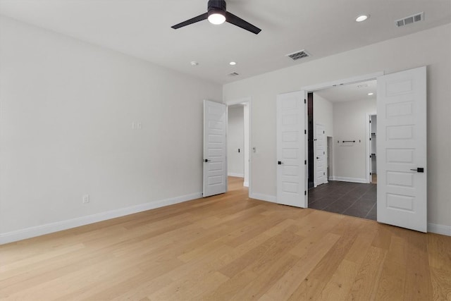 7705 Calcutta Run Dr, Jonestown, TX 78645 - unfurnished bedroom featuring wood finished floors, recessed lighting, and ceiling fan