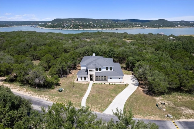 7705 Calcutta Run Dr, Jonestown, TX 78645 - view of subject property with a large body of water