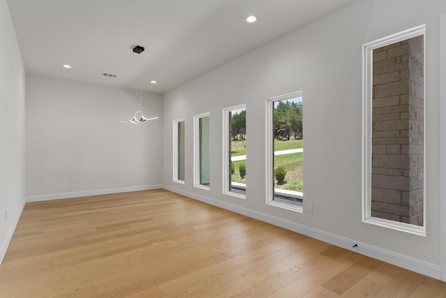 7705 Calcutta Run Dr, Jonestown, TX 78645 - unfurnished room with light wood finished floors and recessed lighting