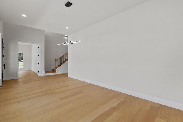 7705 Calcutta Run Dr, Jonestown, TX 78645 - spare room with light wood-type flooring and recessed lighting