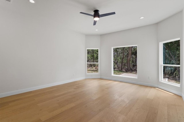 7705 Calcutta Run Dr, Jonestown, TX 78645 - unfurnished room with light wood-style floors, recessed lighting, and ceiling fan
