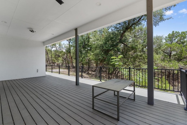7705 Calcutta Run Dr, Jonestown, TX 78645 - wooden deck with view of wooded area