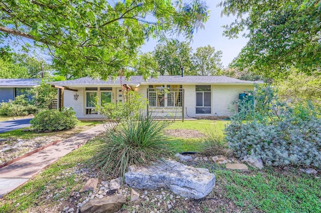 1610 Broadmoor Dr, Austin, TX 78723 - ranch-style house featuring brick siding