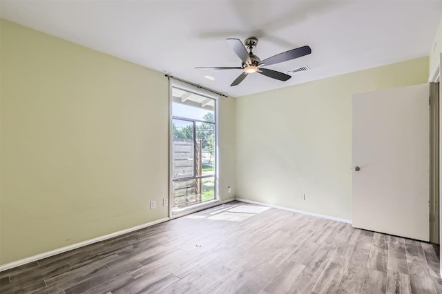 1610 Broadmoor Dr, Austin, TX 78723 - spare room with wood finished floors and ceiling fan