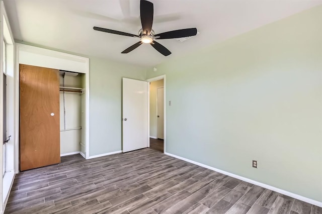 1610 Broadmoor Dr, Austin, TX 78723 - unfurnished bedroom featuring wood finished floors, a closet, and a ceiling fan