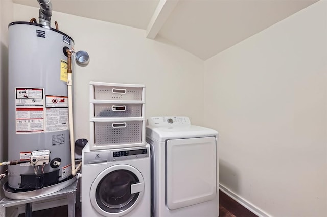 1610 Broadmoor Dr, Austin, TX 78723 - washroom with water heater, independent washer and dryer, and wood finished floors