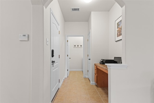 3308 Harvest Time Cv, Austin, TX 78754 - hall featuring light tile patterned floors and arched walkways