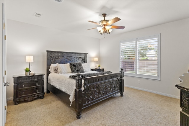 3308 Harvest Time Cv, Austin, TX 78754 - carpeted bedroom with baseboards and a ceiling fan