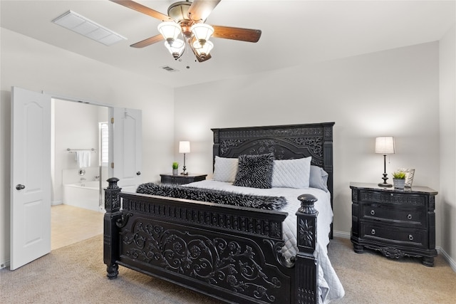 3308 Harvest Time Cv, Austin, TX 78754 - bedroom with carpet floors, a ceiling fan, and ensuite bath