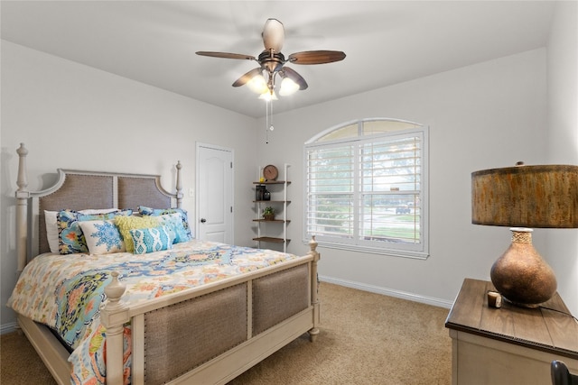 3308 Harvest Time Cv, Austin, TX 78754 - carpeted bedroom with baseboards and a ceiling fan