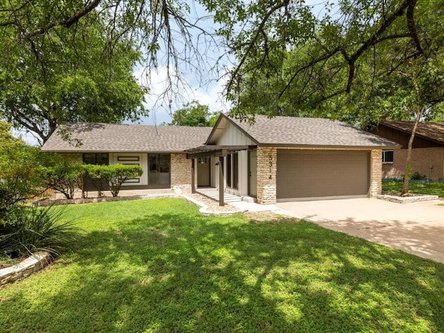 5314 Presidio Rd, Austin, TX 78745 - single story home with concrete driveway, an attached garage, a front yard, and roof with shingles