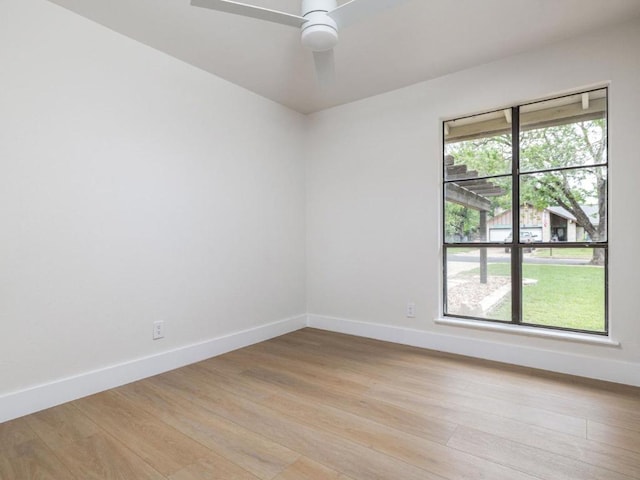 5314 Presidio Rd, Austin, TX 78745 - spare room featuring light wood-style flooring and a ceiling fan
