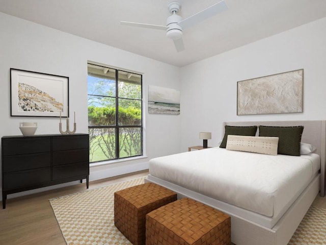 5314 Presidio Rd, Austin, TX 78745 - bedroom with wood finished floors and ceiling fan