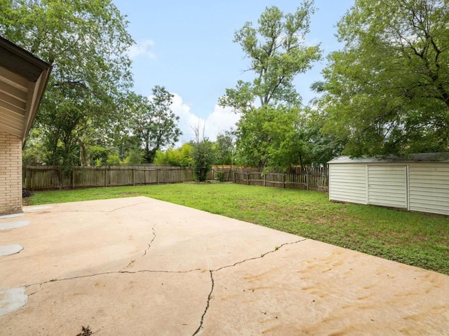 5314 Presidio Rd, Austin, TX 78745 - fenced backyard featuring a patio and a storage unit
