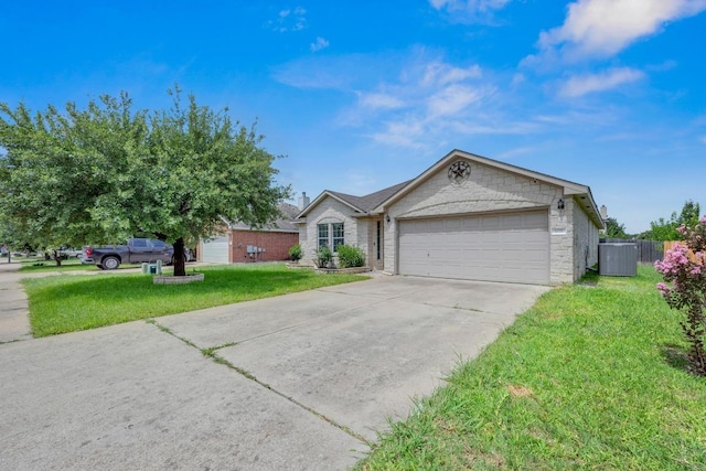 109 Inman Dr, Hutto, TX 78634 - ranch-style home with an attached garage and driveway
