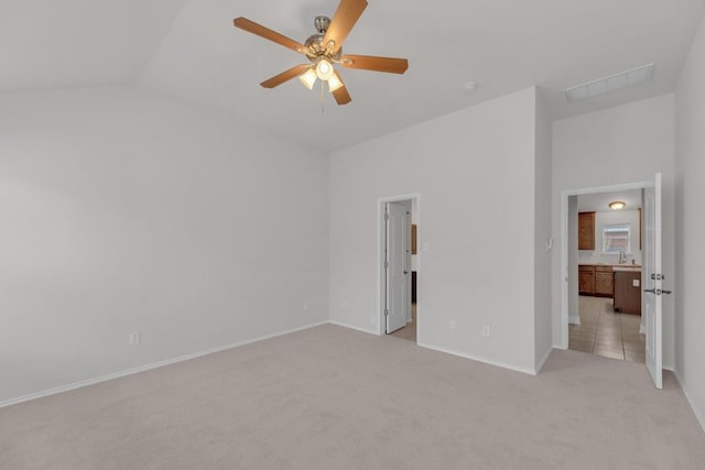 109 Inman Dr, Hutto, TX 78634 - unfurnished bedroom featuring light colored carpet, lofted ceiling, and ceiling fan