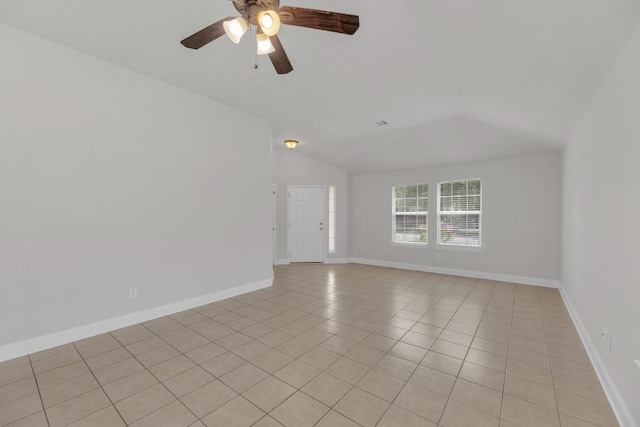 109 Inman Dr, Hutto, TX 78634 - unfurnished room with lofted ceiling, light tile patterned flooring, and a ceiling fan