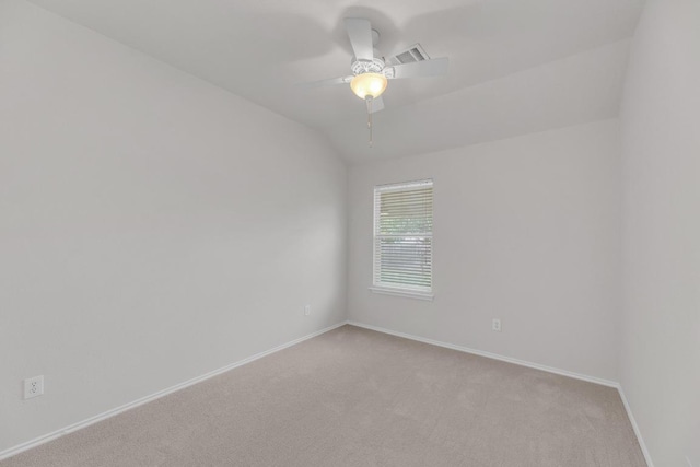 109 Inman Dr, Hutto, TX 78634 - unfurnished room featuring light carpet, a ceiling fan, and lofted ceiling