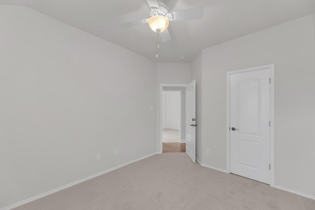 109 Inman Dr, Hutto, TX 78634 - unfurnished bedroom featuring light carpet and a ceiling fan